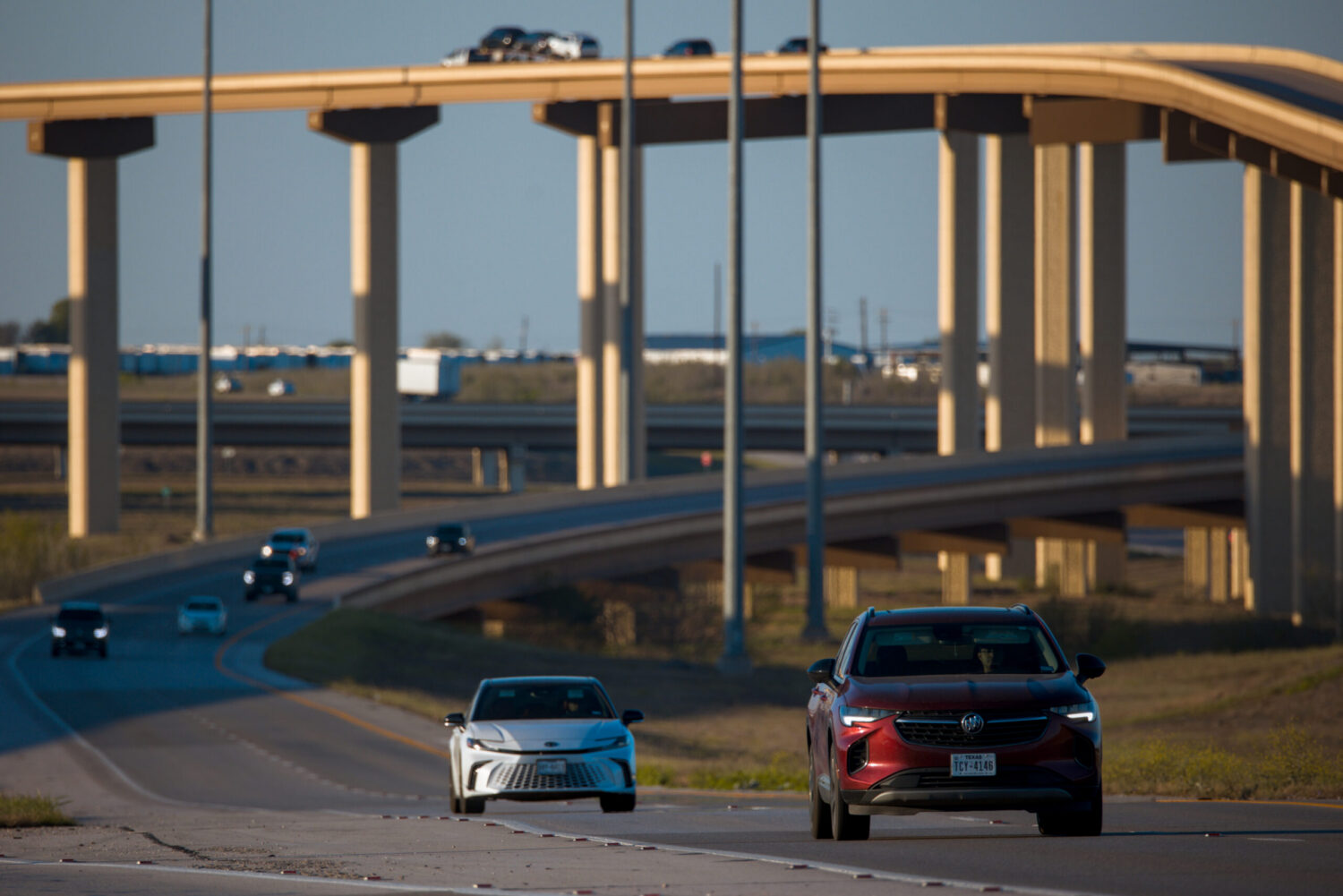 Cars driving down SH 130 in Texas